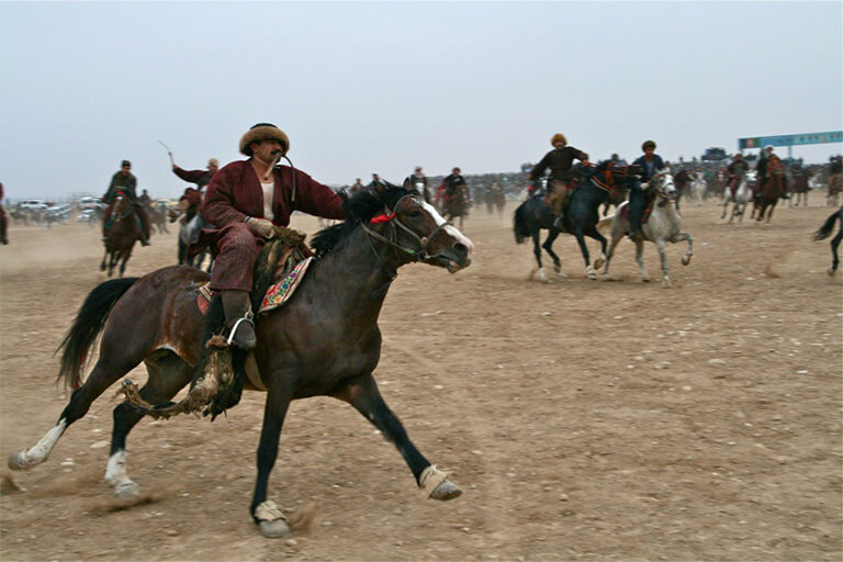 Buzkash, the national sport of Afghanistan. It is a traditional sport in which horse-mounted players attempt to place a goat carcass in a goal.