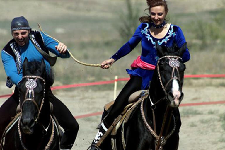 People horse riding.