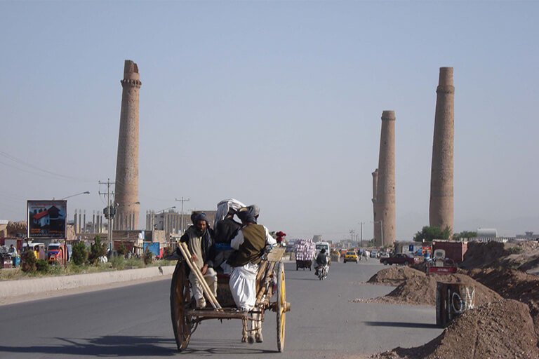 Cart with some people riding into Herat, Afghanistan.