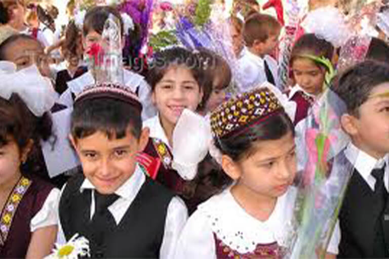 A group of kids dressed up.