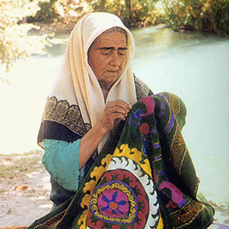 A woman sewing.