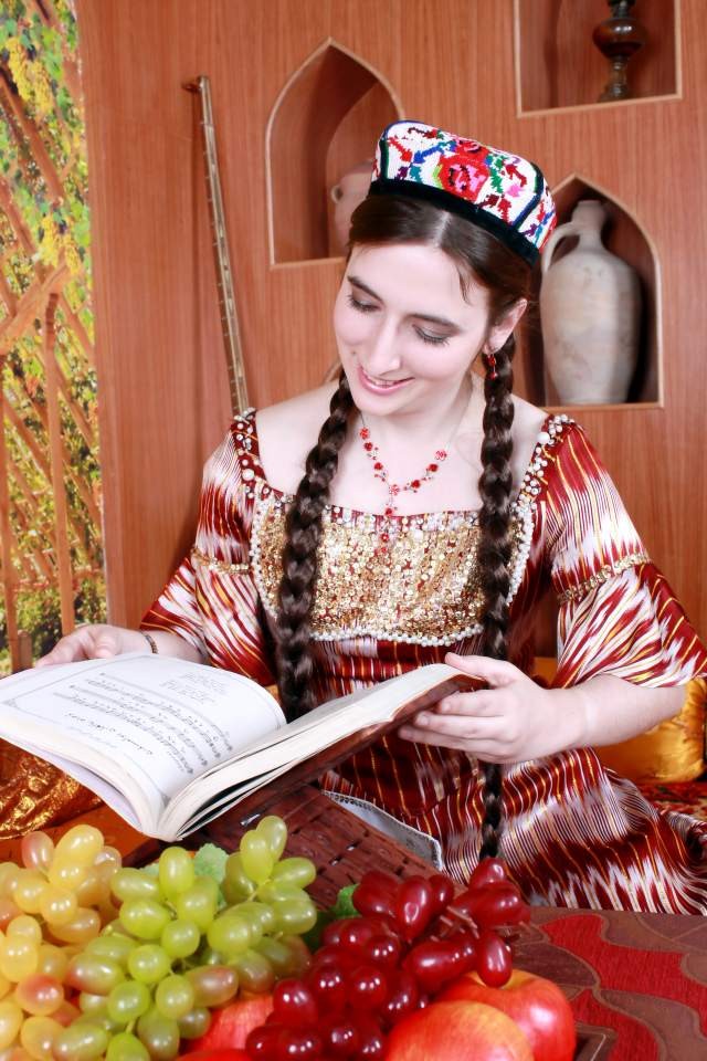 karen-in-uyghr-dress-book-reading